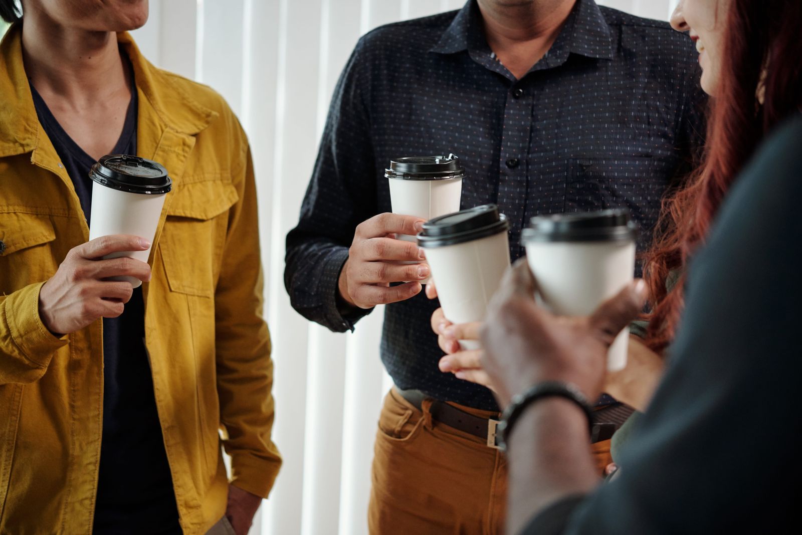 Coffee cups with black lids